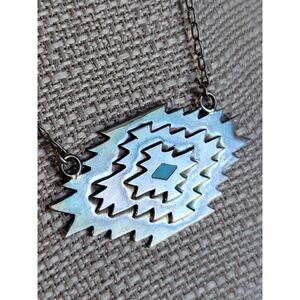 Southwestern or Native American-style silver pendant necklace, Geometric Pattern